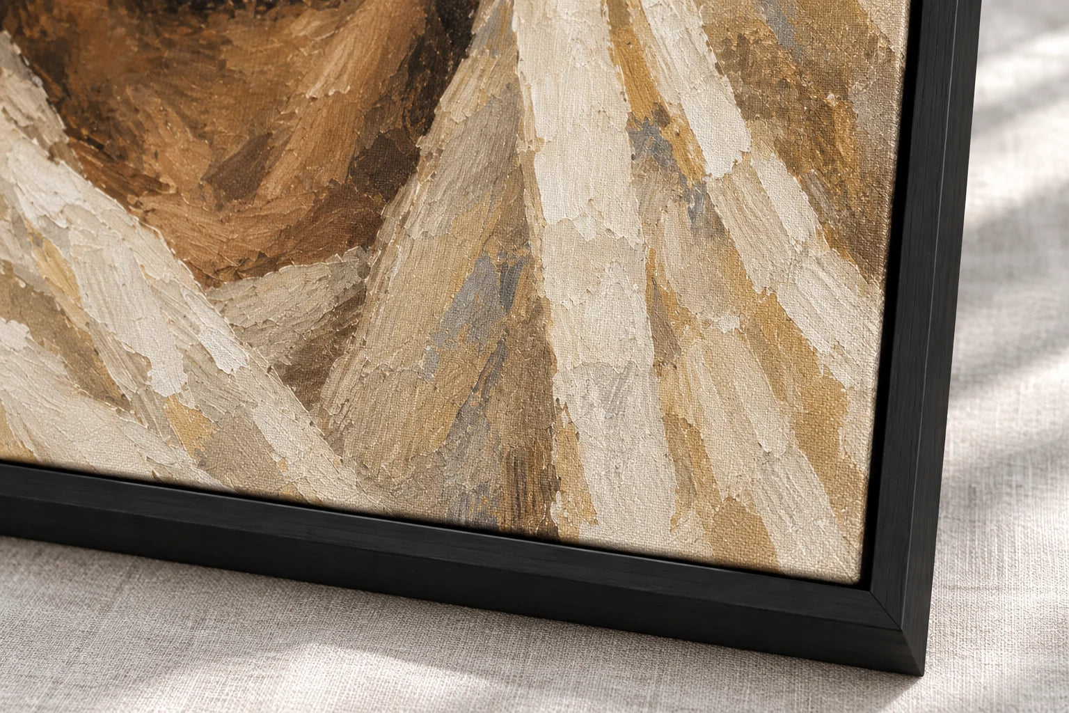 Close view of the printed canvas surface and black frame corner